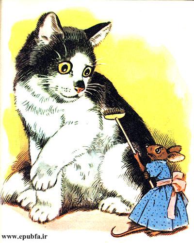 موش جارویی را که در گوشه انبار بود برداشت و گربه را تهدید کرد.